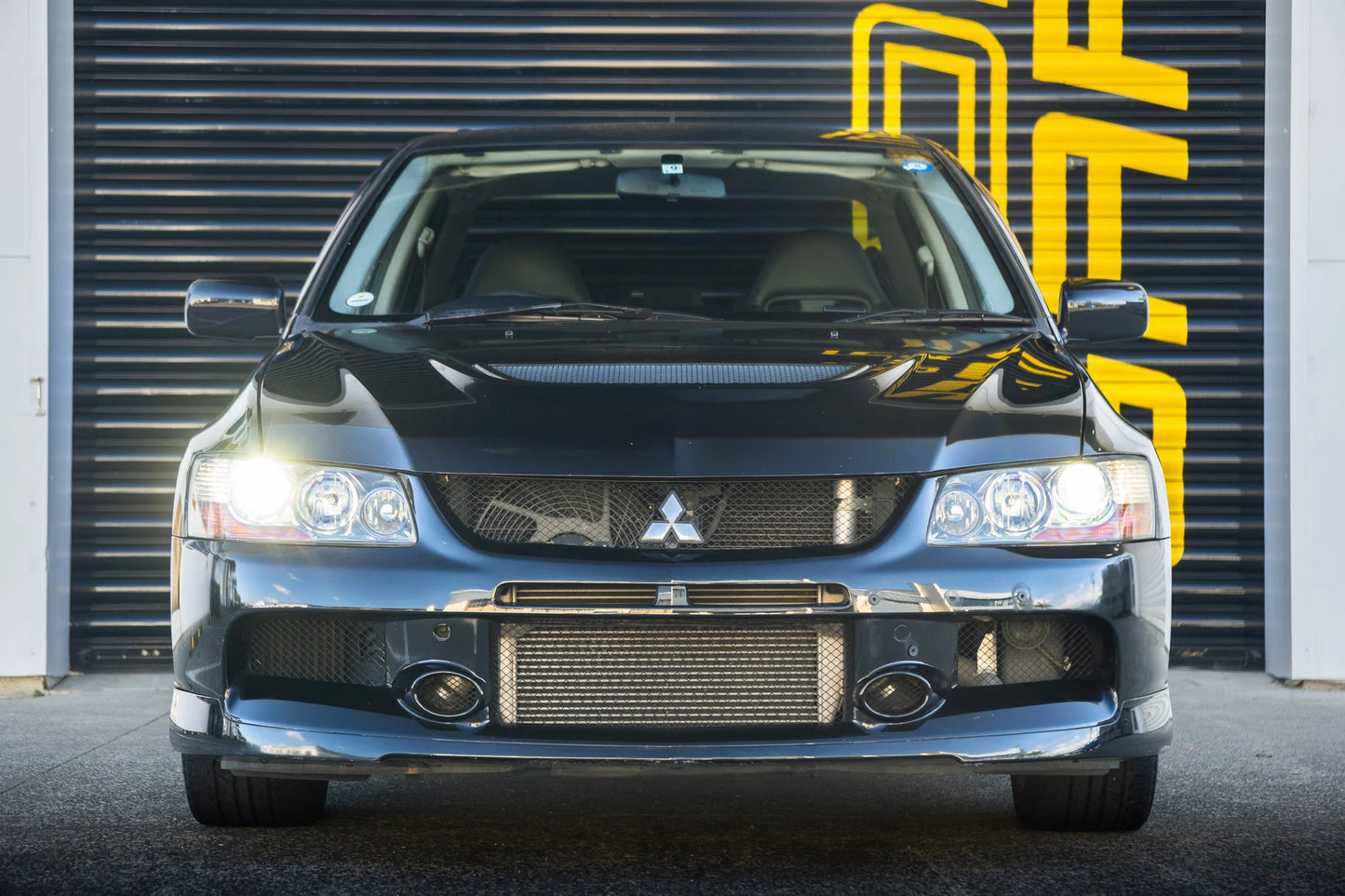 Mitsubishi Lancer EVO 9 Front Bumper ( 6400B000 )